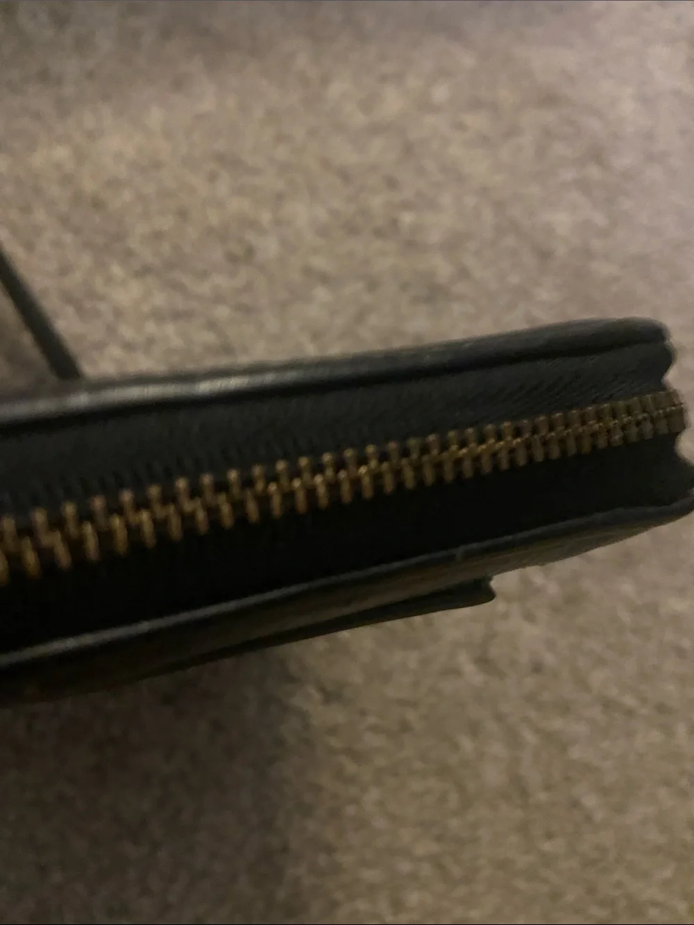Fossil Black Leather Zip Wristlet with Gold Accent, gently used lots of life.